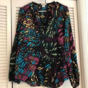 Harold’s blouse size medium